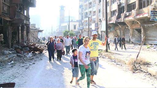 بازگشت هزاران نفر از اهالی حمص به خانه‌های ویرانه خود