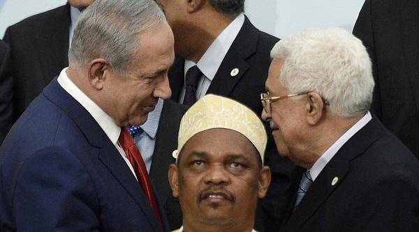 معمای دست دادن عباس و نتانیاهو در پاریس + عکس