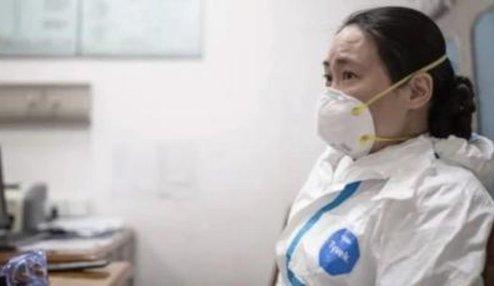 اولین فرد مبتلا به کرونا پیدا شد:یک زن چینی فروشنده میگو +عکس