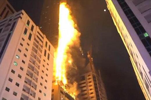 ببینید | برج مسکونی ۴۸ طبقه در امارات که سراپا آتش شد
