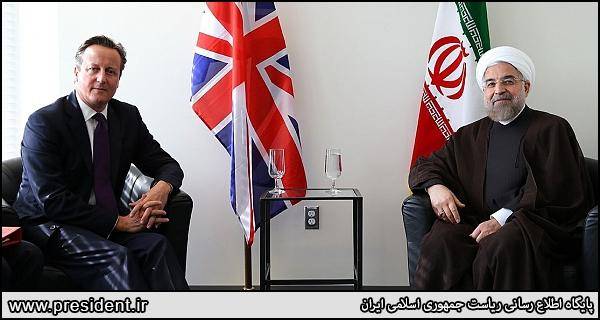 دیدار روحانی و نخست وزیر بریتانیا (+عکس)