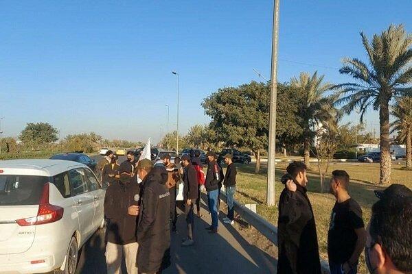 حضور گسترده معترضان و نیروهای امنیتی در اطراف فرودگاه بغداد